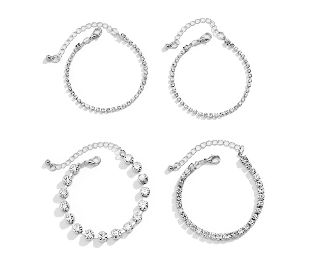 Goldene Armbänder mit Kristallen – Set aus 4